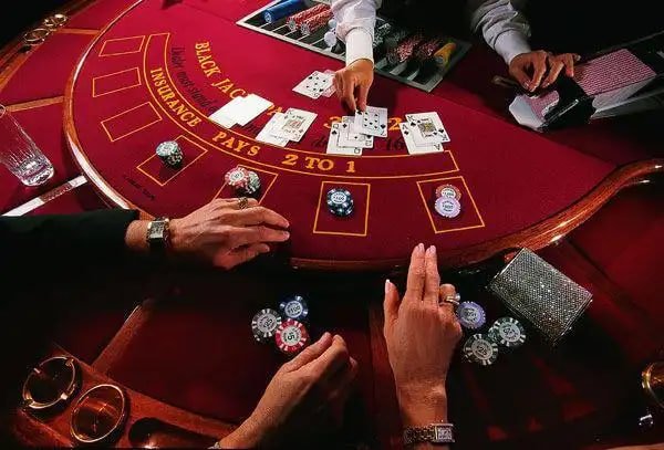 Filipino player checking withdrawal status on a smartphone after a casino session